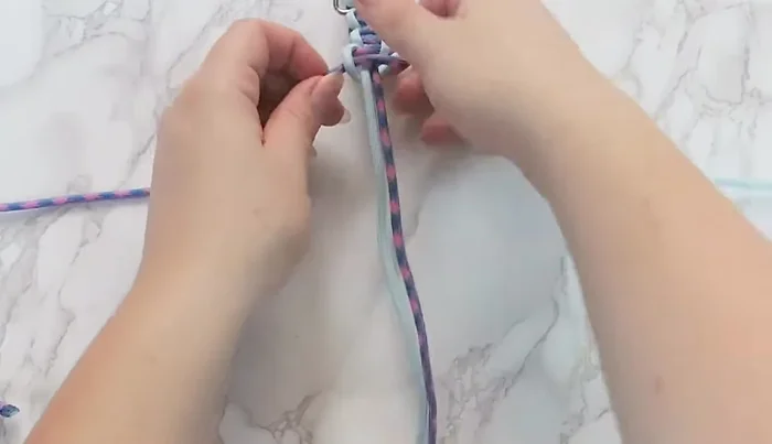 Cut and melt the excess paracord ends.