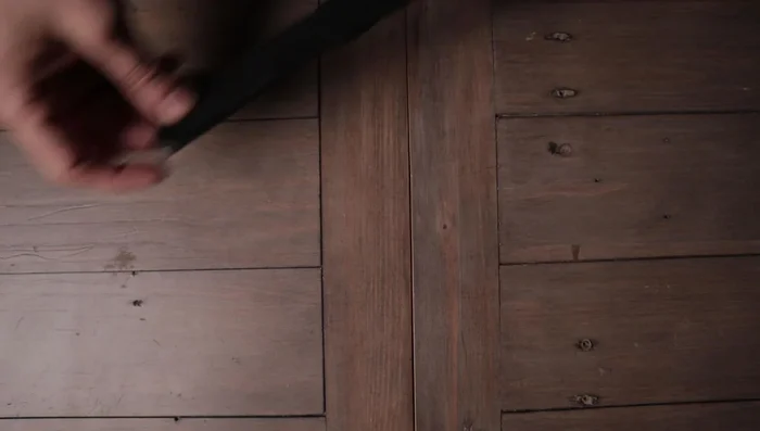 Start as before, finding the center of the first fleece strip (black in example) and placing the second strip (yellow in example) across the center to form a cross.