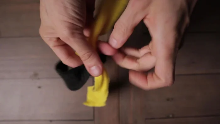 Finish by tying off the ends with knots and trimming excess fabric.