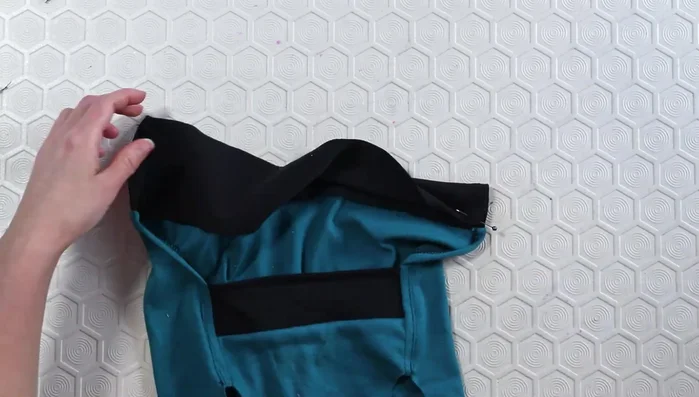 Fold and topstitch the hem with a double needle.