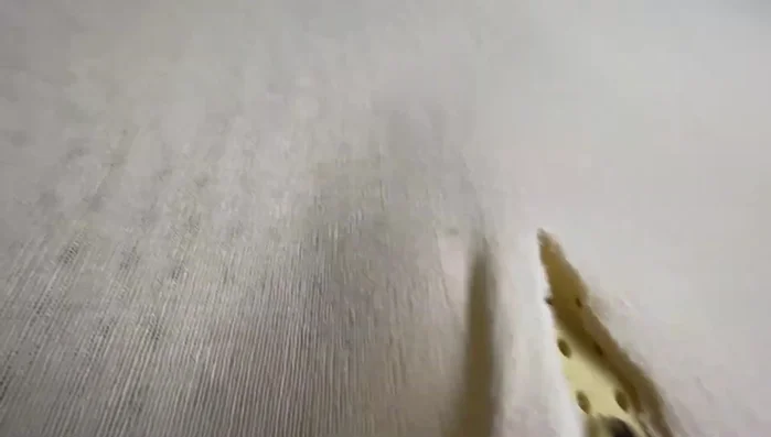 Remove the cloth covering the mattress.