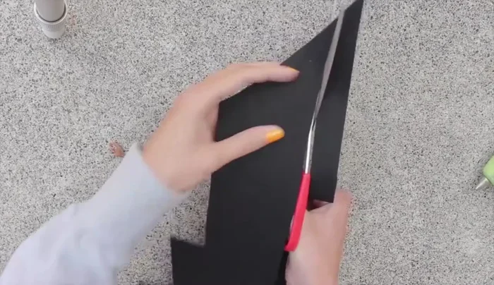 Cut another felt strip for the head, glue ribbon to the ends for tying.