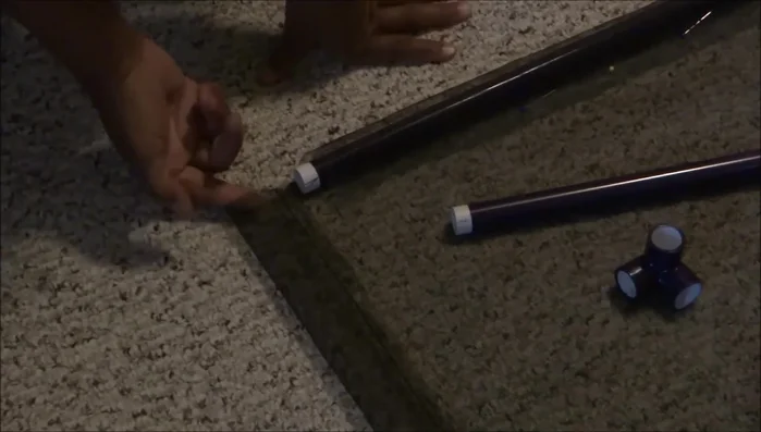 Sew the corners: Fold over the corners of the mesh and pin to secure. Sew along the pinned edges to attach the mesh to the pipe.