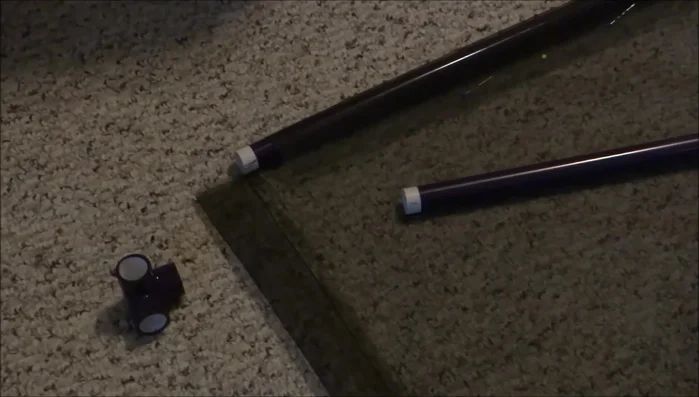 Sew the corners: Fold over the corners of the mesh and pin to secure. Sew along the pinned edges to attach the mesh to the pipe.