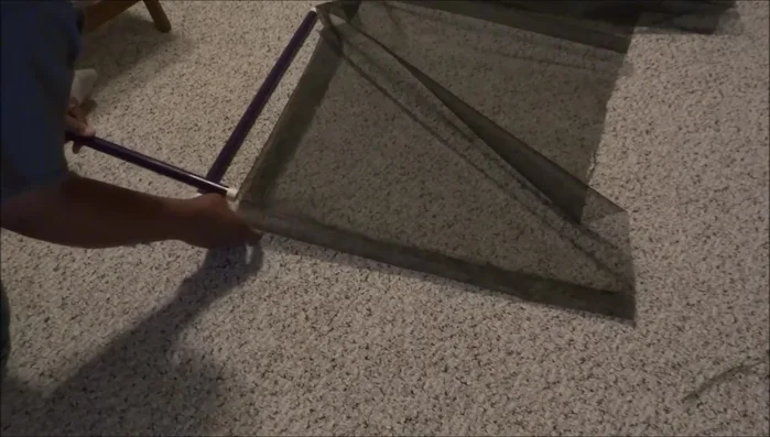 Assemble the bed: Sew together the short and long sides of the mesh panel to create the complete bed frame.