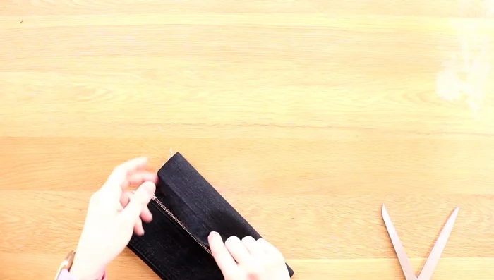 Attach the velcro and sew around it on the inside.