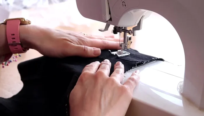 Attach the velcro and sew around it on the inside.