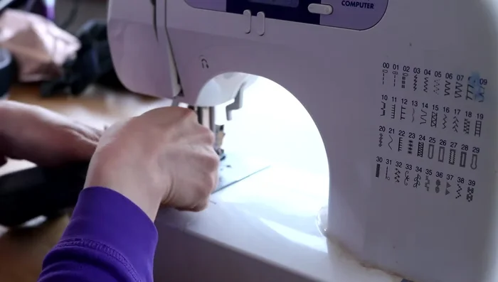 Repeat for the second pouch, ensuring zips face the same way.