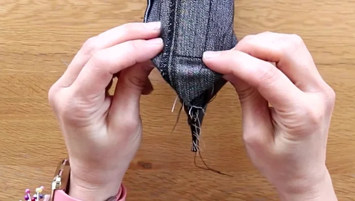 Trim excess fabric with pinking shears.