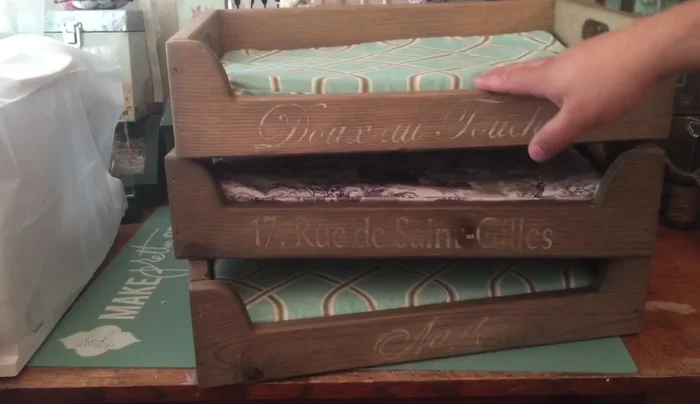 Assemble the dog bed: Attach the mattress to the wooden base.