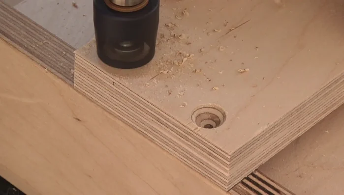 Attach the leg stretcher to the legs.