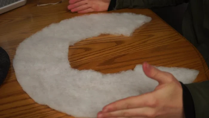 Sew the inner brim to the outer brim, securing the batting.