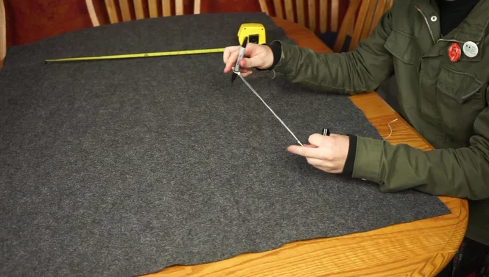 Cut a slice out of the remaining felt to create a slope for the hat brim. Try it on and adjust until it fits snugly.