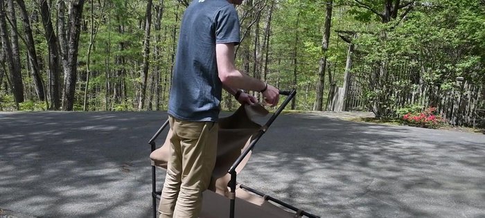 Assemble the awning, ensuring it can be easily connected and detached using snaps.