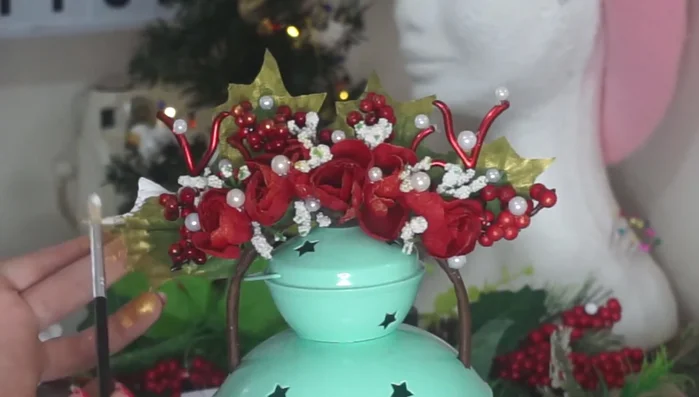 Add a snowy effect using white acrylic paint on the leaves (optional).