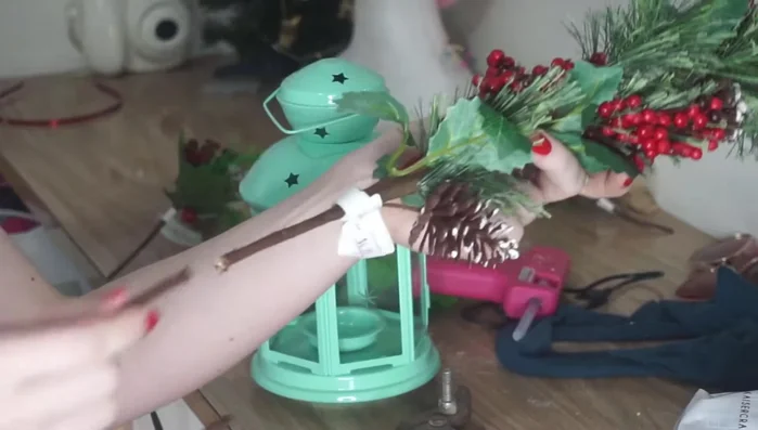 Cut a piece of wire from a flower arrangement, bend it into a crown shape, and test it on your dog's head for fit.