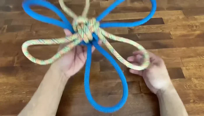 Adjust and even out the loops to create the final dog flower shape.