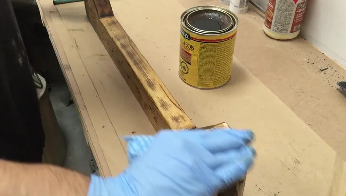 Assemble the four side pieces to the plywood base using glue and brad nails.