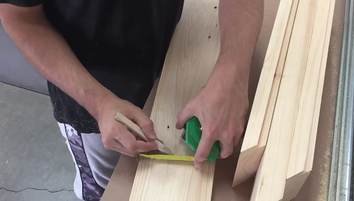 Mark and cut out an opening (approximately 7 inches in from each side and 2 inches up from the bottom) on the front piece.