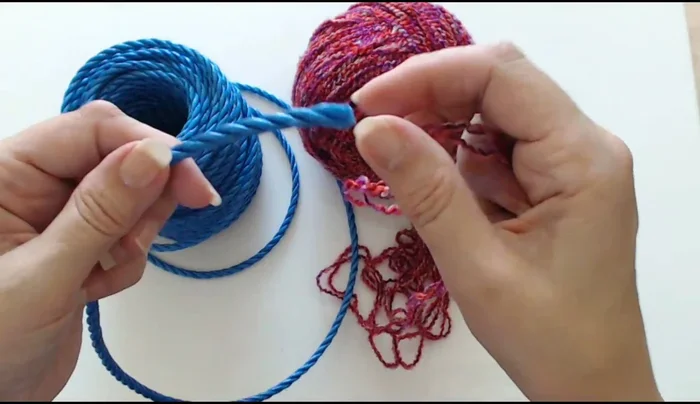 Once you have a sufficient amount of wrapped yarn, secure the end.