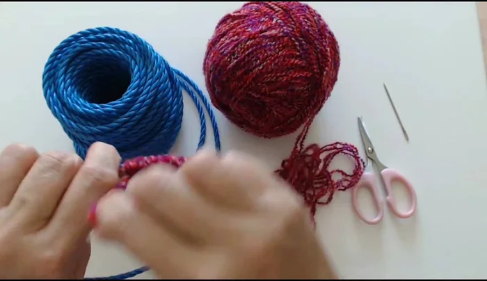 Wrap the yarn continuously, creating layers. You can decide the thickness and tightness of the wrapping.