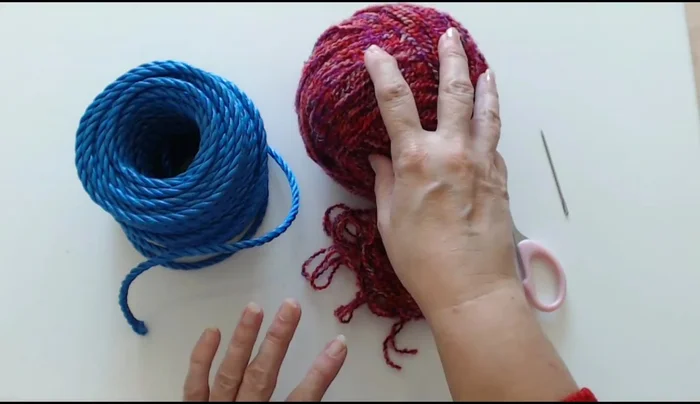 Wrap the yarn continuously, creating layers. You can decide the thickness and tightness of the wrapping.