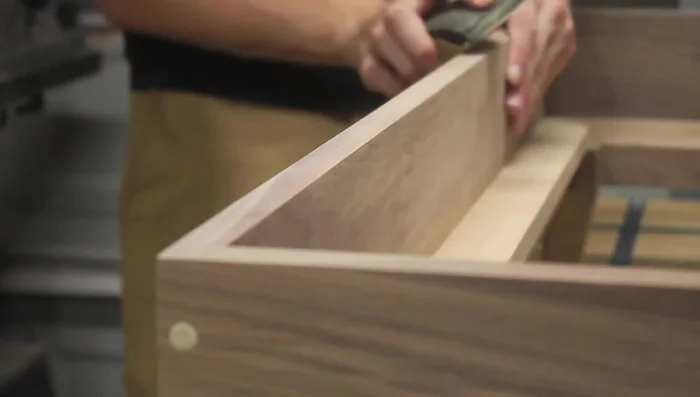 Apply paste wax with steel wool to enhance the wood's natural beauty (optional, but recommended with Polycrylic).