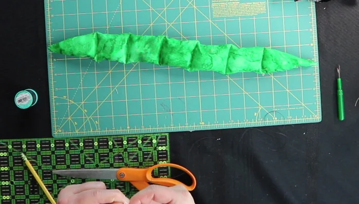 Add eyes: Sew on black thread eyes for safety; avoid buttons or plastic eyes.