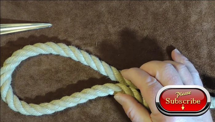 Secure the Marlin eye splice by tucking the rope end multiple times.
