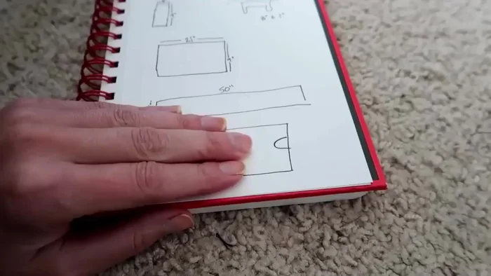 Cut armholes into the back piece (3 inches down from the top, 1.5 inches long, and extending 2 inches into the garment).