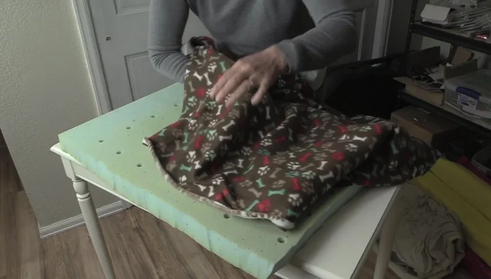 Cut out a second piece of fleece fabric (bottom piece) the same size as the top piece.