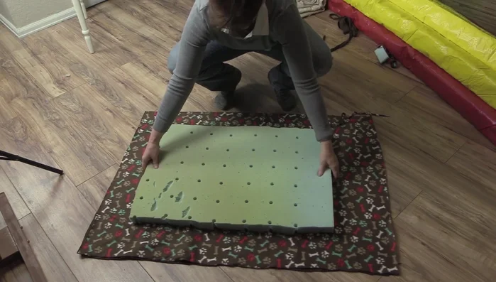 Place the memory foam on top of both fleece pieces.