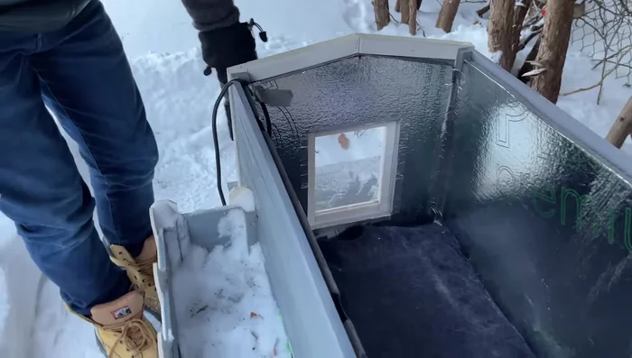 Add a clear vinyl layer as an additional door flap to reduce drafts.