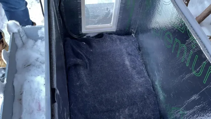 Add padding (wool sweater and pet heating pad) for warmth and comfort.