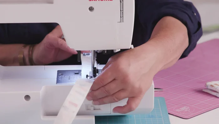 Hand stitch the turning gap on the collar closed.