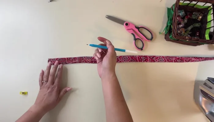 Attach D-ring and Buckle (collar): Measure and mark 3 inches from the edge. Place the D-ring and buckle at the marked point, fold the fabric over, and sew securely using multiple rows of stitching.