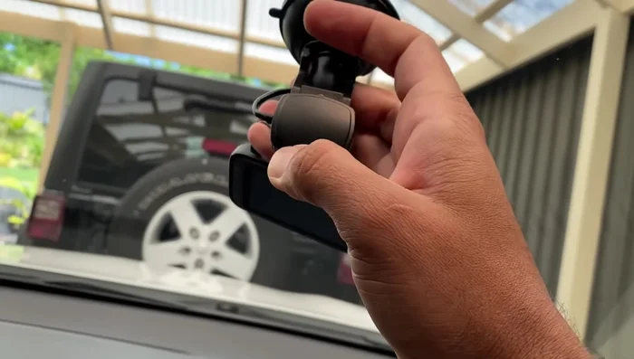 Attempt to attach the suction cup to the windscreen; it should adhere firmly.