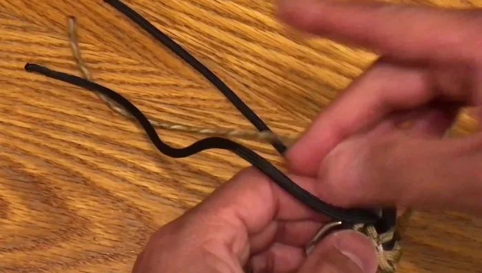 Finish by melting the ends of the paracord to prevent fraying.