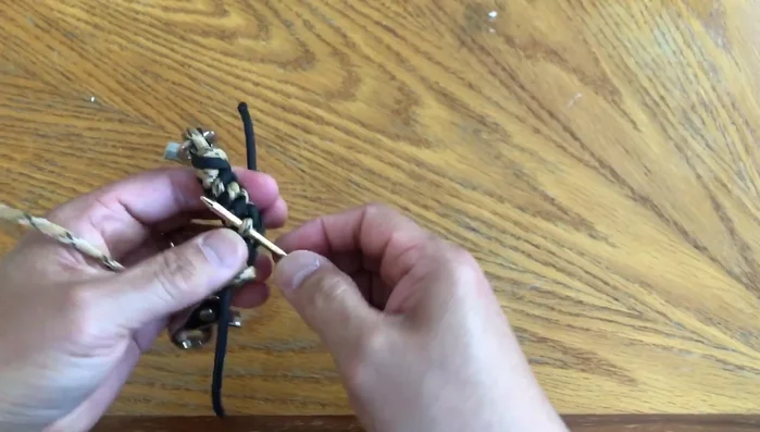 Securely tuck each strand individually.