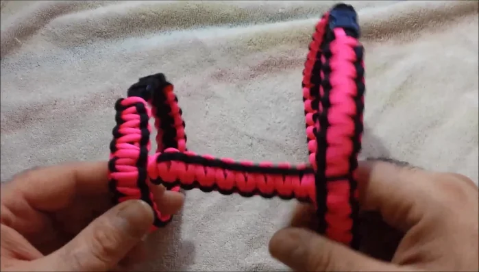 Complete the weave, trim the excess paracord, and singe the ends to prevent fraying.