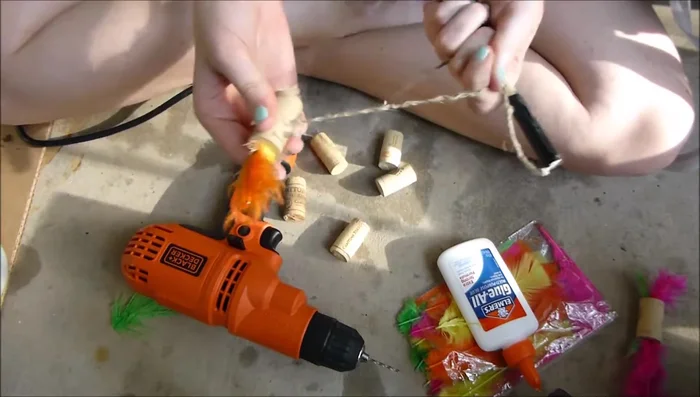 For the fascinator toy: Braid hemp cord and attach it to a stick using tape.