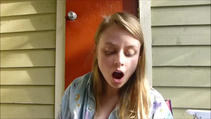 Attach the fascinator to a wine cork with feathers.