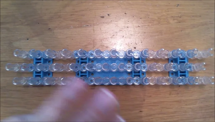 Use double loops for the remaining bands, starting with a single dark brown band.