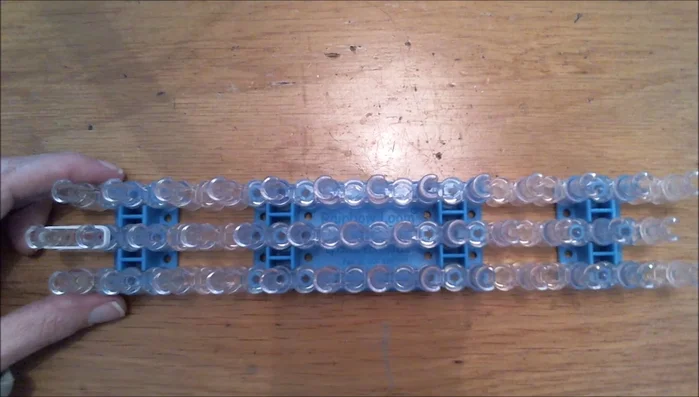 Use double loops for the remaining bands, starting with a single dark brown band.