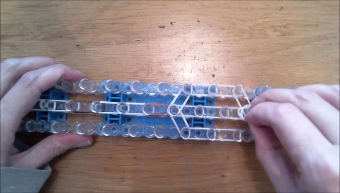 Close the figure with two white bands.