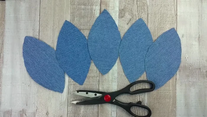Cut out five identical pieces of denim.