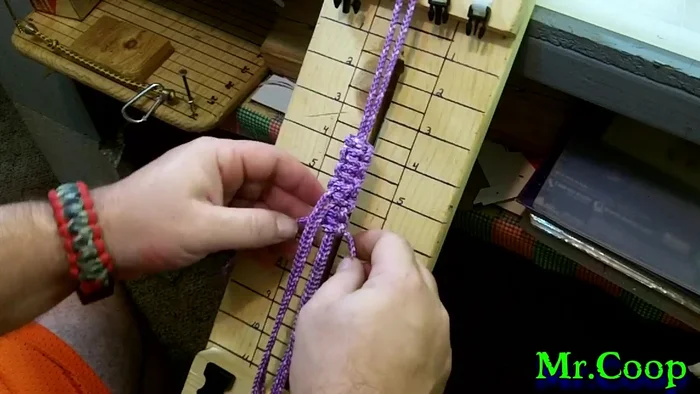 For a double cobra knot (wider handle), reverse the direction of the cobra knot at the end and wrap back around.