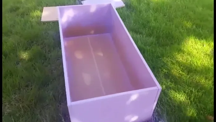 Prepare the base: Remove panels from an old shelf. One panel will be used as the headboard.