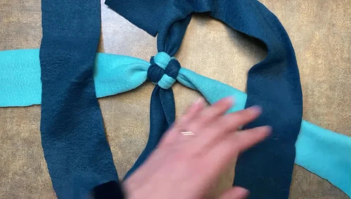 Continue repeating steps 2-6 until the desired length of the toy is achieved.