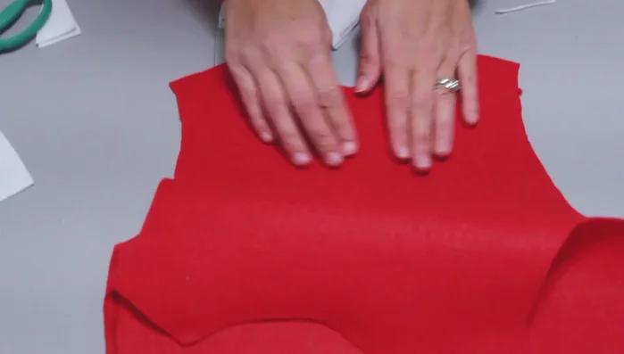 Sew the side seams together. Again, sewing is shown but taping is offered as a viable no-sew alternative.